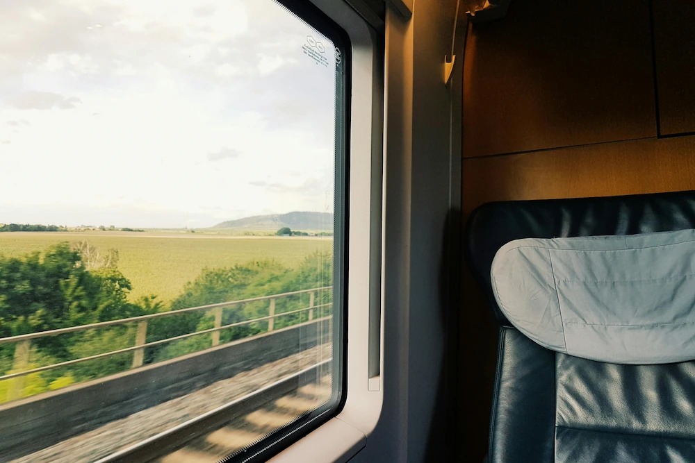 Andalusian landscape viewed from a train window, symbolizing our literary journey